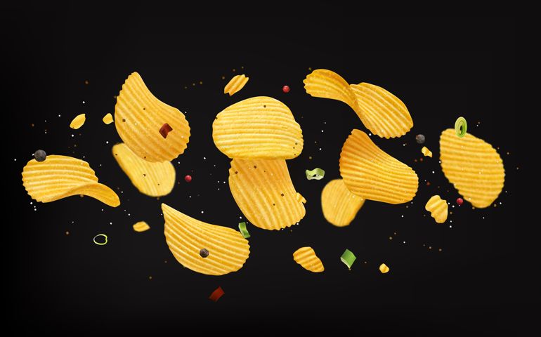 Flying crispy ripple potato chips with onion and spices flavor, vector realistic snacks food. Baked or ribbed potato chips splash explosion with taste of salt, green onion and hot chili pepper