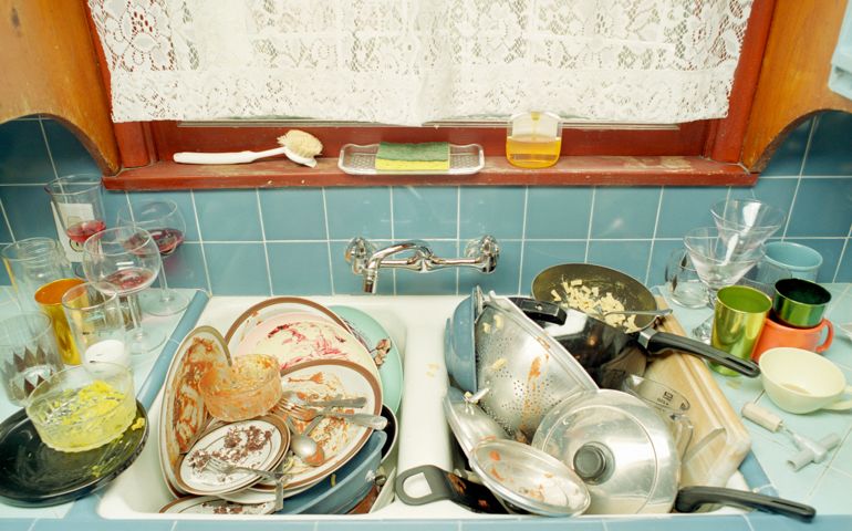 Sink full of dirty dishes