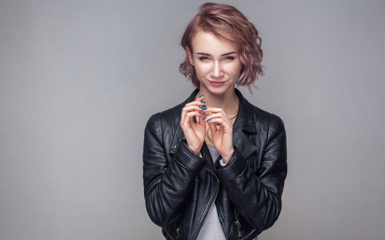 Portrait of cheater beautiful girl with short hairstyle,