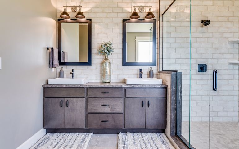 Gorgeous double mirrors and subway tile wall