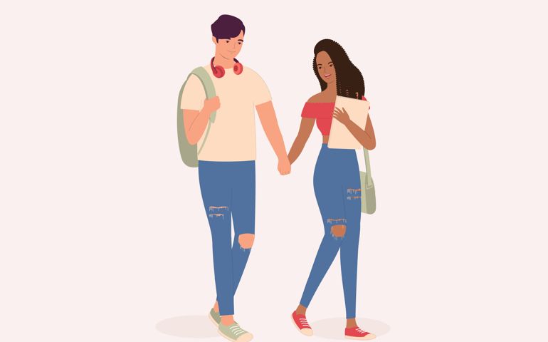 Interracial Young Couple With White Man And Black Woman Smiling, Walking And Holding Hands Together. Isolated On Color Background.
