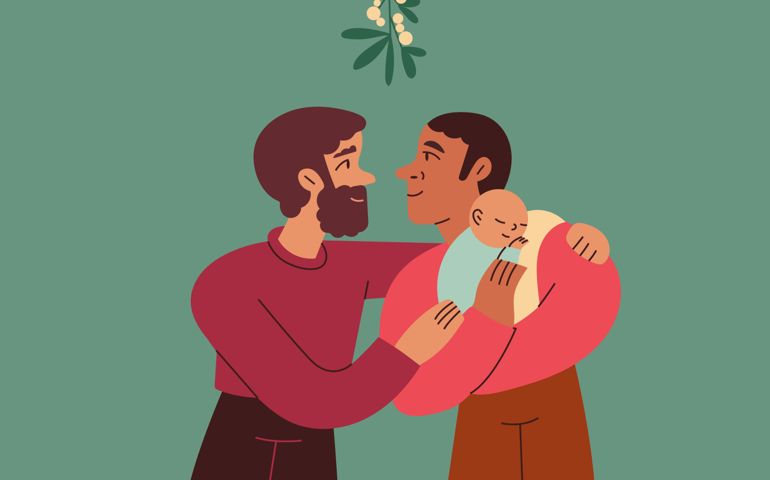 Two gay dads look lovingly at each other under mistletoe while holding their baby child