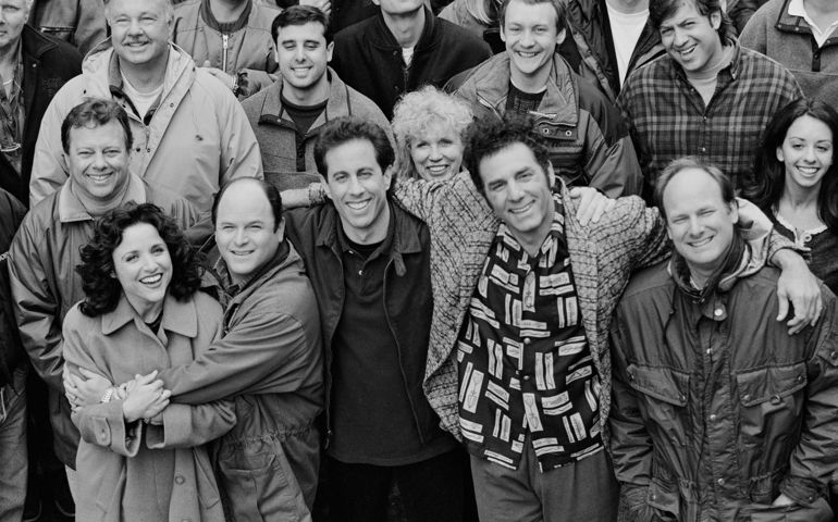 The cast and crew of the hit television show "Seinfeld" pose on set during the last days of filming the final episode, April 3, 1998 in Studio City, California.. From left to right in the front row are actors Julia Louis-Dreyfus (Elaine), Jason Alexander (George), Jerry Seinfeld (Jerry), Michael Richards (Kramer), and director Andy Ackerman.