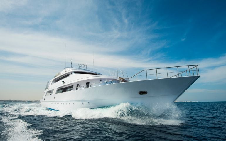 Luxury private motor yacht sailing at sea