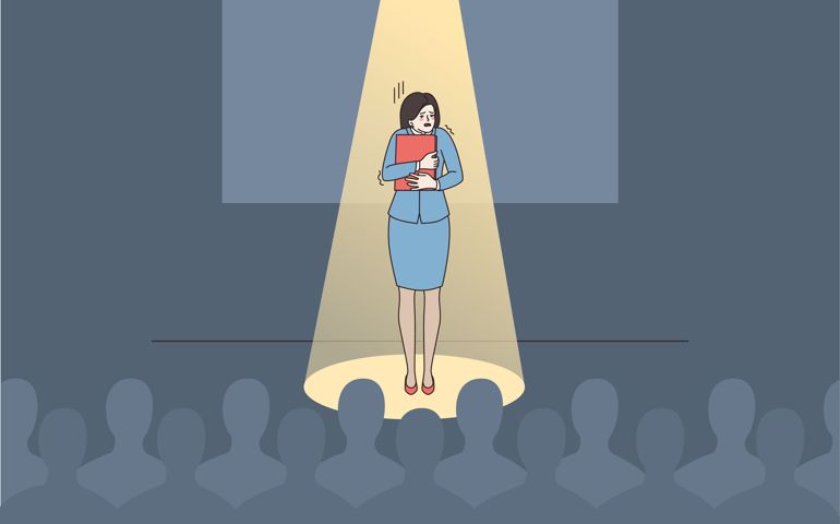 Anxious young woman speaker or presenter feel scared nervous of public speaking.