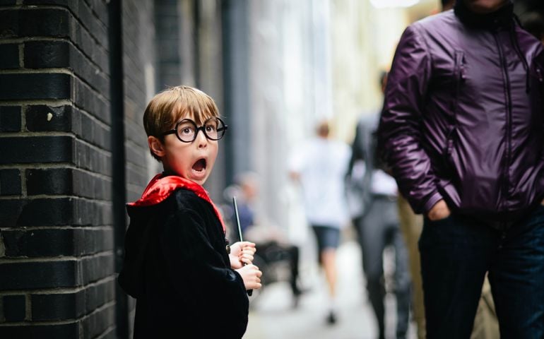 Boy, pretending to be Harry Potter.