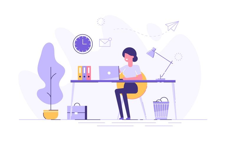 Beautiful businesswoman using laptop while sitting at her desk. Office workplace interior.
