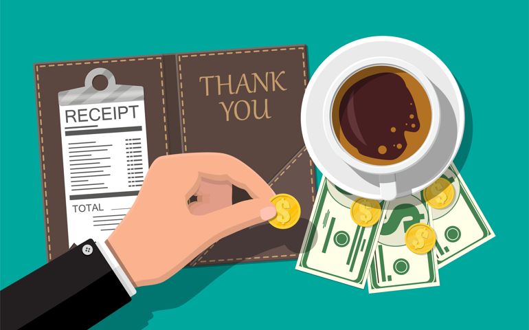 Folder with cash coins and cashier check. Coffee cup. Thanks for the service in the restaurant.