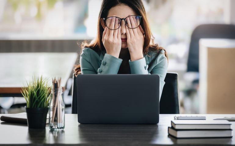 Concept Burnout Syndrome. Business Woman feels uncomfortable working.