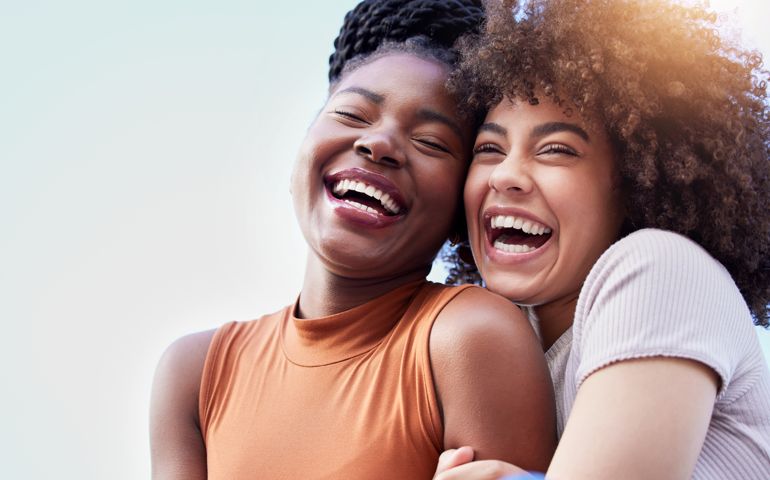 Shot of two young women spending time together outdoors