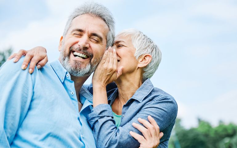 portrait of happy smiling senior couple outdoors