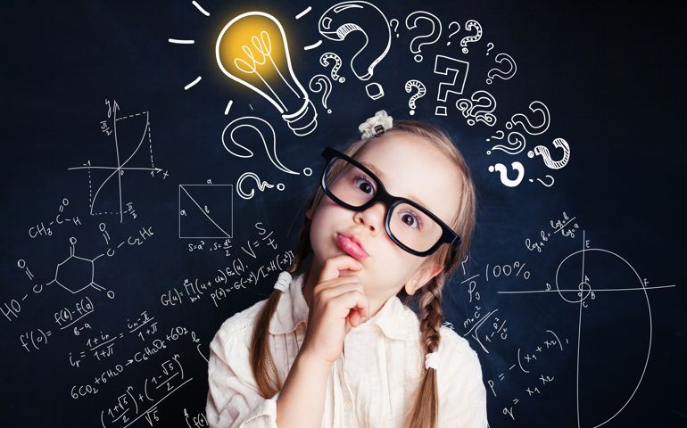 Small child mathematics student thinking on background with lightbulb and math formulas.