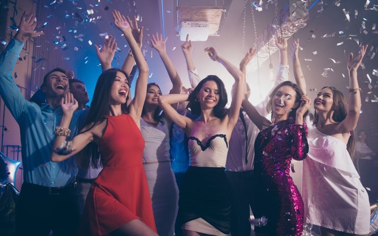 Careless, carefree, dream, dreamy person dance on corporate, feast, festive raise hands up, close eyes