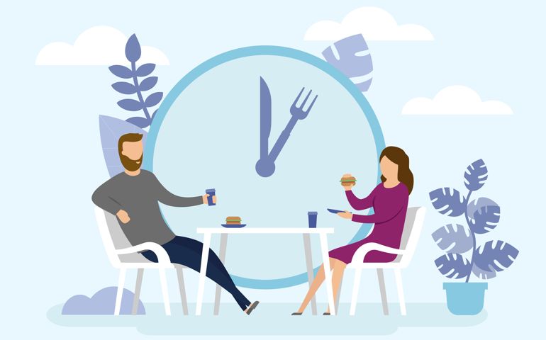 Man and Woman are eating together. Business Lunch Time concept.