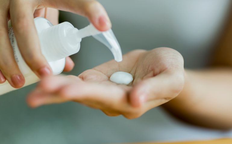 Young woman caring for skin