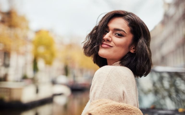 Shot of a beautiful young woman out and about in the city