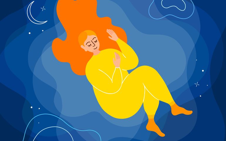 A girl sleeps in space surrounded by the moon and stars.