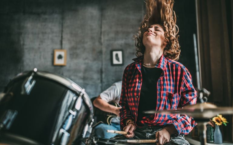 Teenager Playing Rock and Roll At Home
