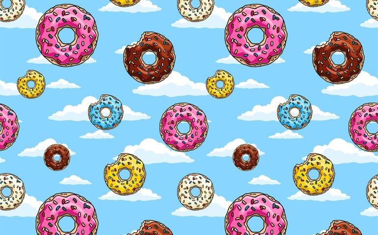Donuts with pink glaze and colored sprinkles on blue sky background. Seamless pattern. Texture for fabric,