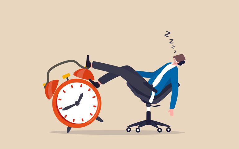 fternoon slump, laziness and procrastination postpone work to do later, boredom and sleepy work concept, businessman sleeping lay down on office chair and alarm clock covered his face with book.