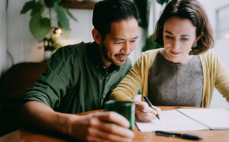 Couple planning and designing their future home