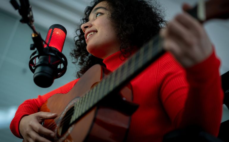 Recording playing guitar and singing