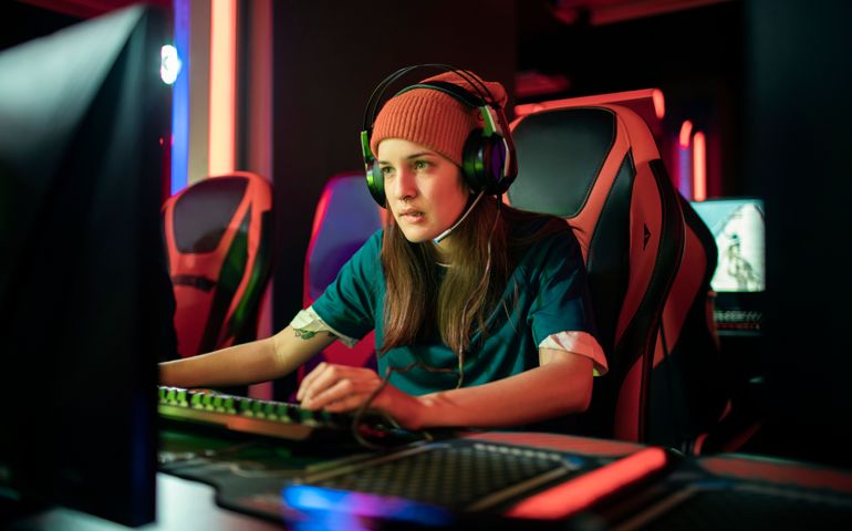 Close up of a female eSports team competing in an eSports tournament at an eSports Venue