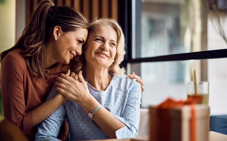Two women hugging