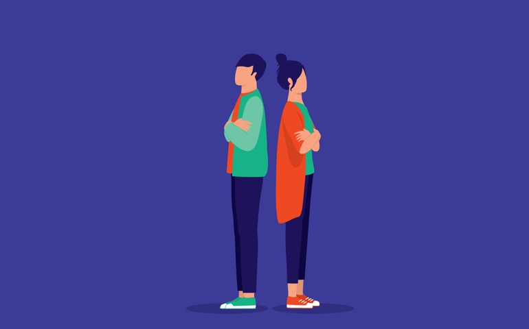 Angry Young Couple Turning Their Backs Against One Another.