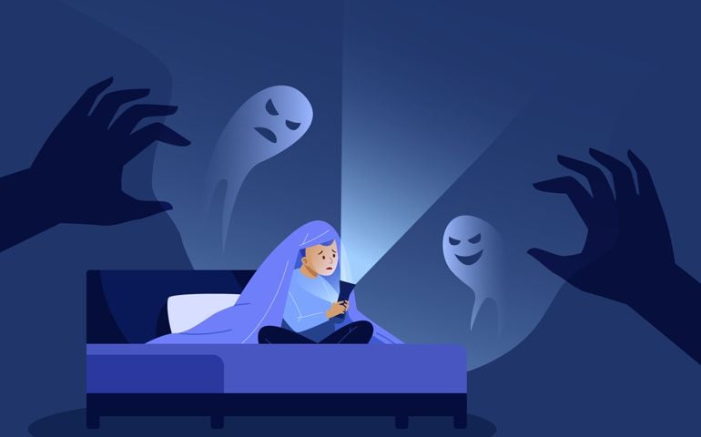 Children nightmares. Anxiety kid under blanket scared of monster bed dark