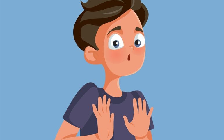 Teenager feeling shy pushing away with hand gesture