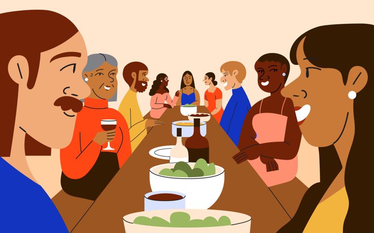 A group of friends gather for a holiday dinner party at a long shared table