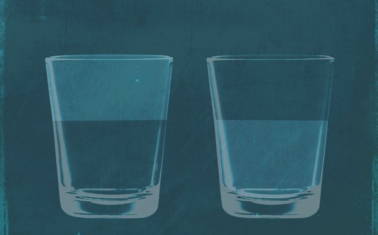 A half full glass of water next to a half empty glass of water