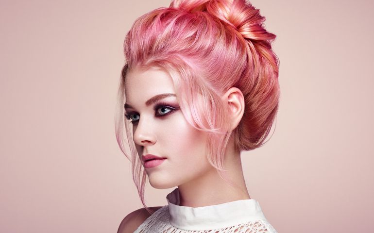 Blonde girl with elegant and shiny hairstyle
