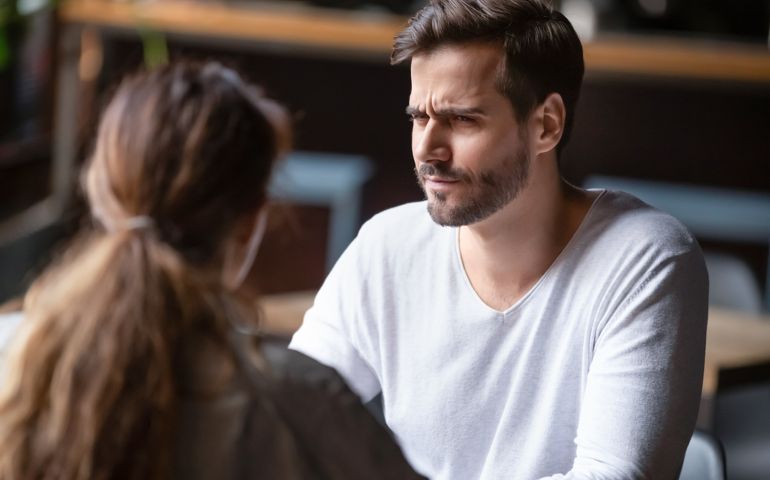 man confused expression with friend