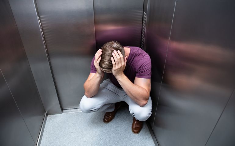 Worried Man With Hands On Head
