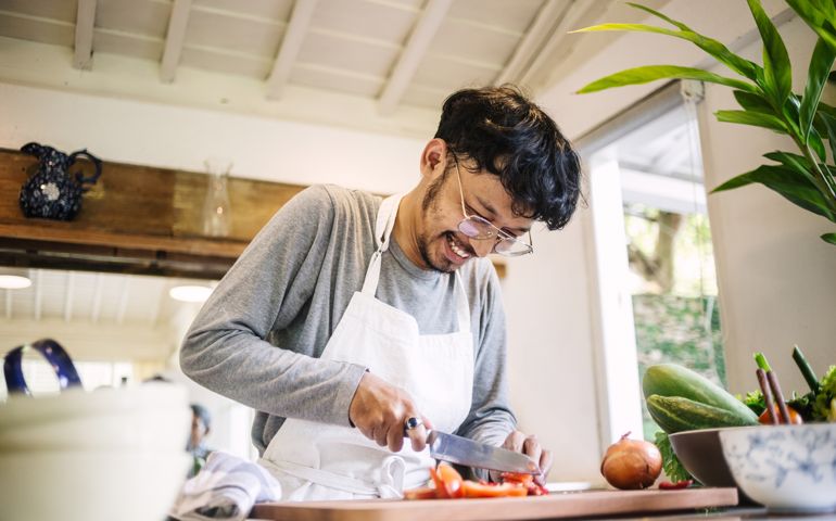 Young man preparing to cook