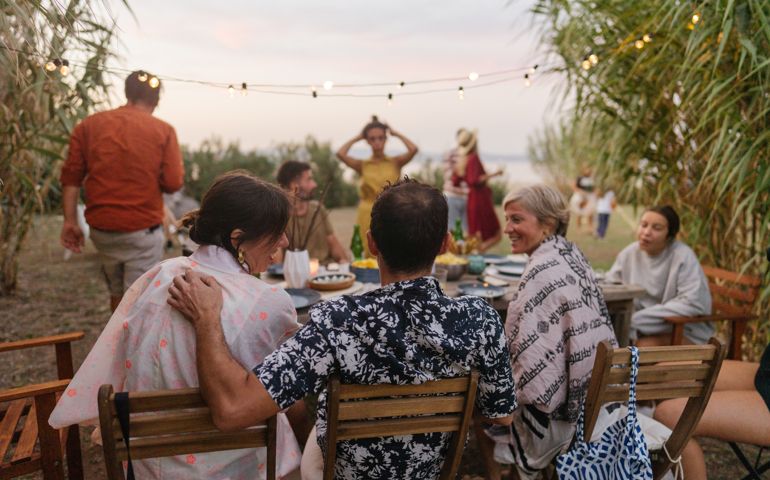 Family having a summer dinner party