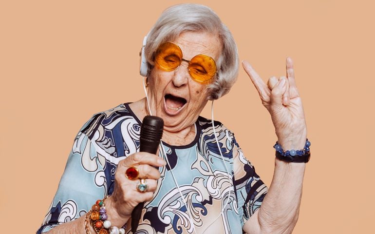 Funny elderly rockstar grandmother singing