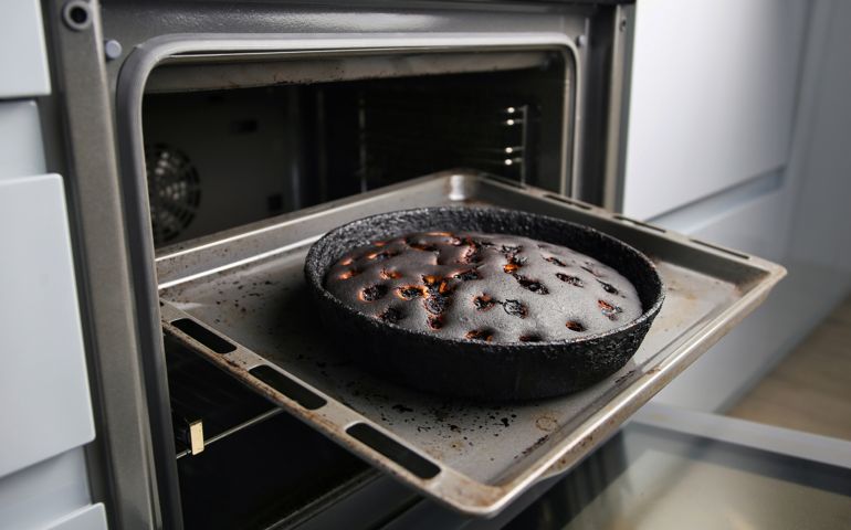 Burnt pie in the oven.