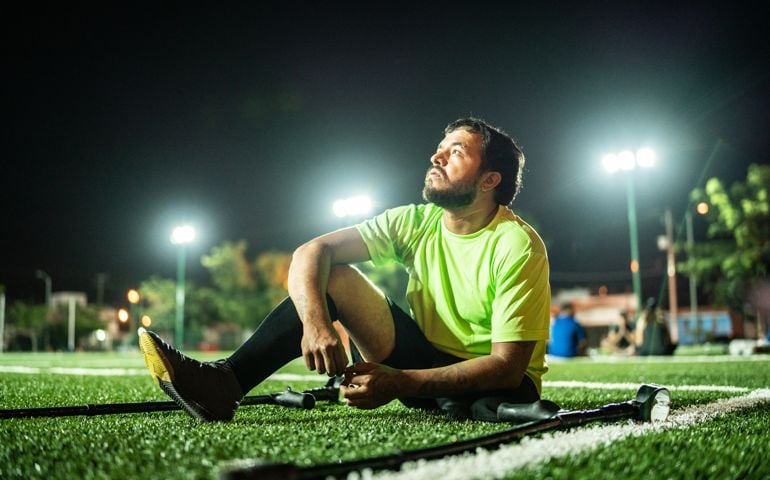 sad man loses soccer game