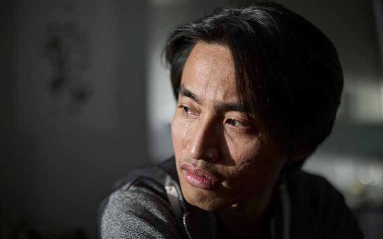 Portrait of crying man looking away