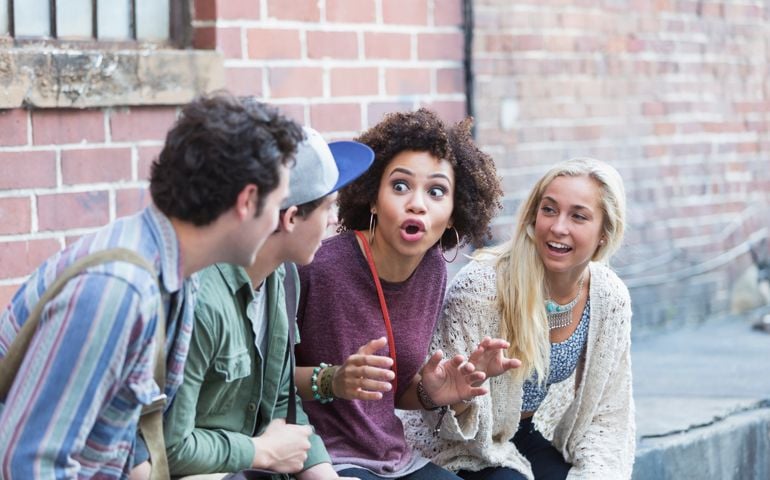 Young adults hanging out talking