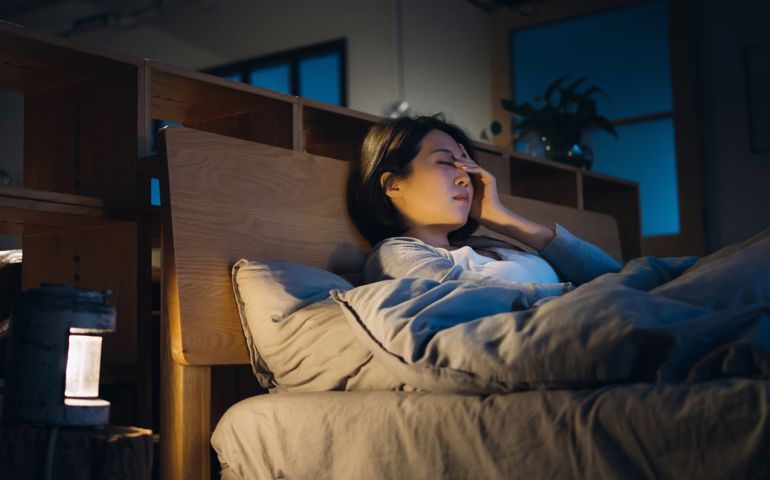 woman unable to sleep