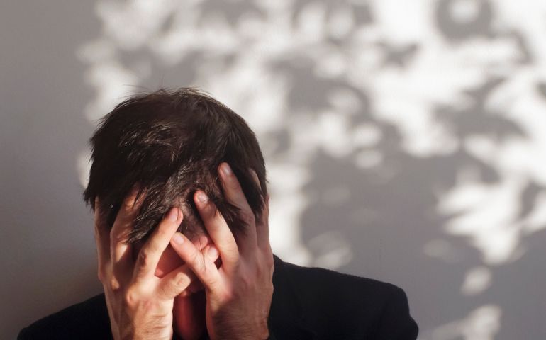 Troubled man suffering mental illness