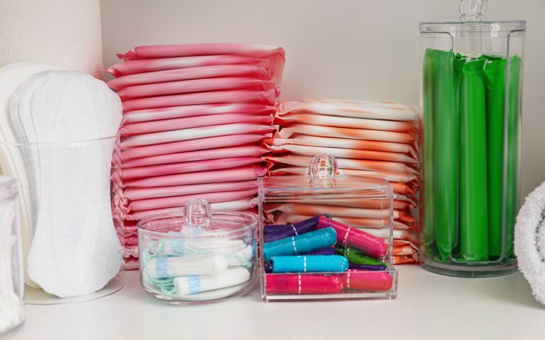 Storage of different feminine hygiene products in cabinet