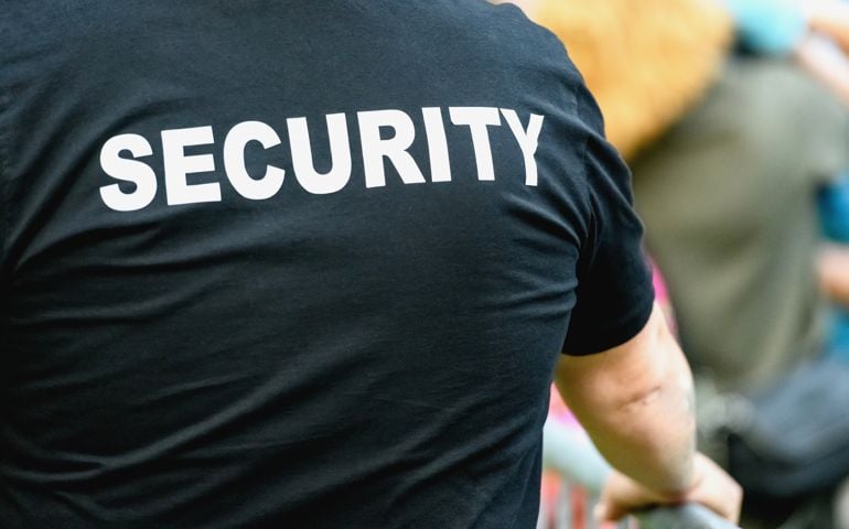 Rear view of security staff