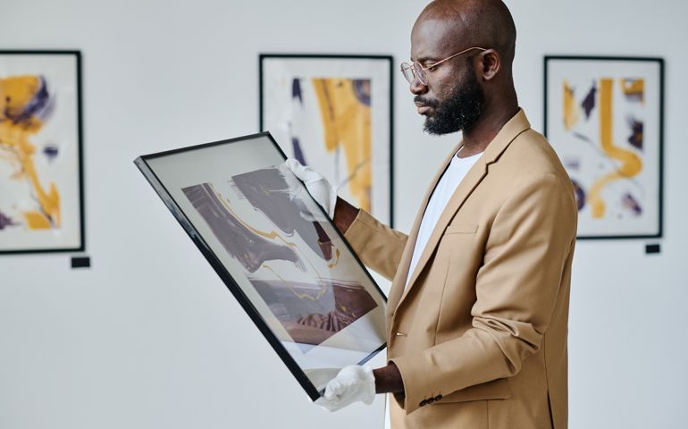 Guide working at art gallery