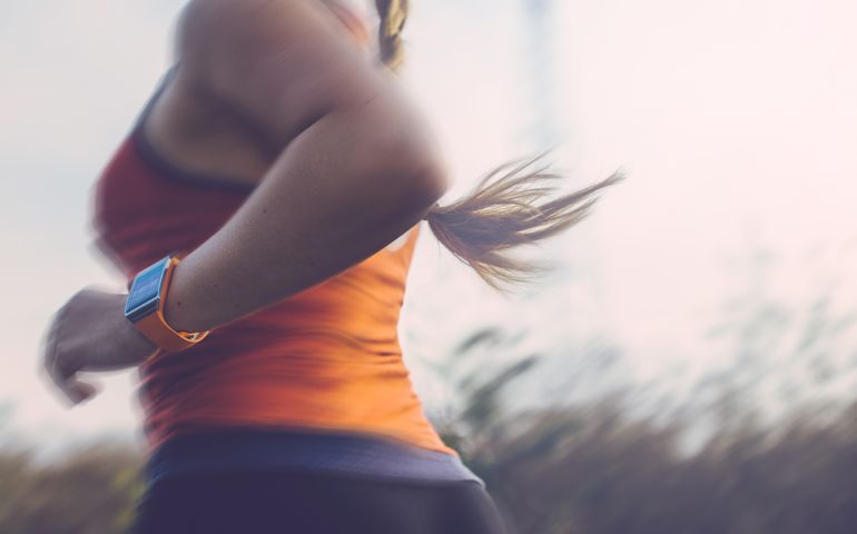 Woman running outdoor.