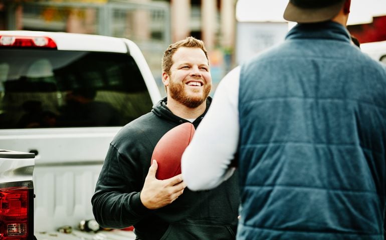 Man hanging out during tailgating party